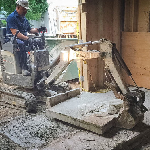 démolition petite pelle mécanique drummondville forage de béton
